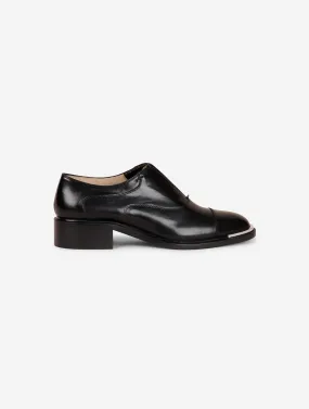 Derbies en cuir noir