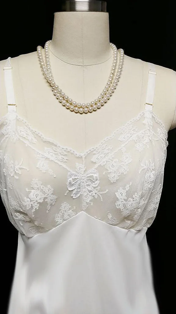 *VINTAGE '60s ARISTOCRAFT BY SUPERIOR SLIP DRIPPING WITH LACE AND SATIN BOW APPLIQUE